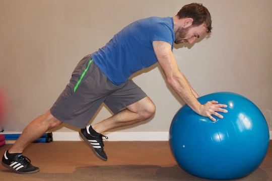 Mountain Climbers deomstrated by Vancouver Chiropractor are a great core strengthening exercise